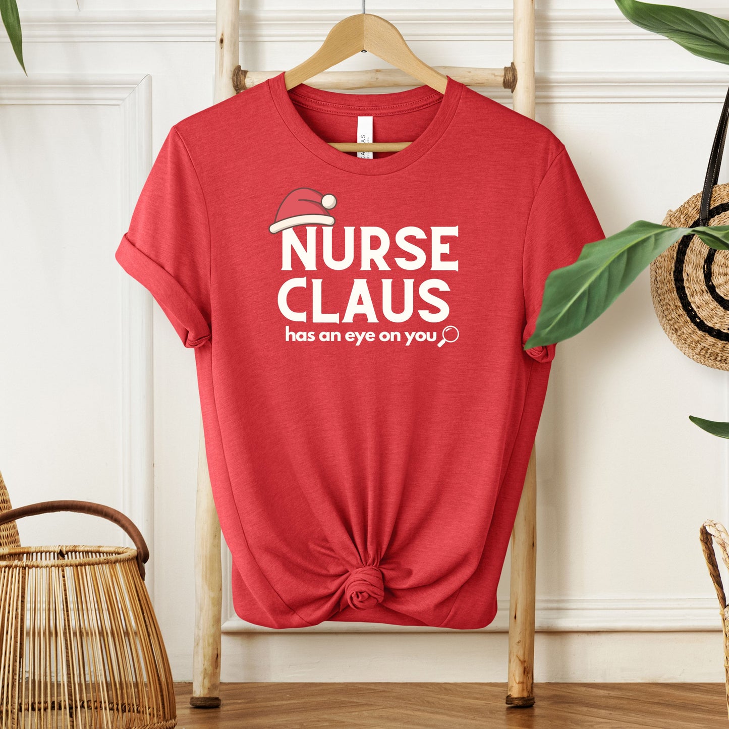 Nurse Claus Crewneck T-shirt – Retro Christmas Nurse Gift with Santa Hat and Magnifying Glass
