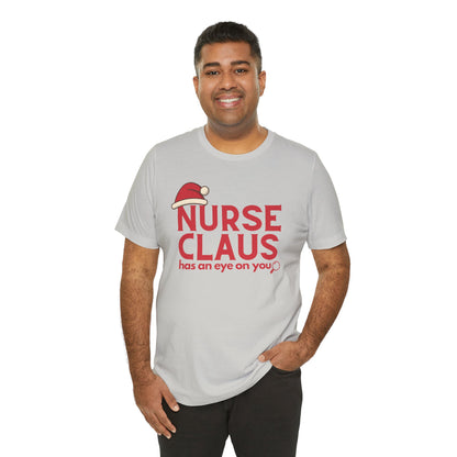 Nurse Claus Crewneck T-shirt – Retro Christmas Nurse Gift with Santa Hat and Magnifying Glass